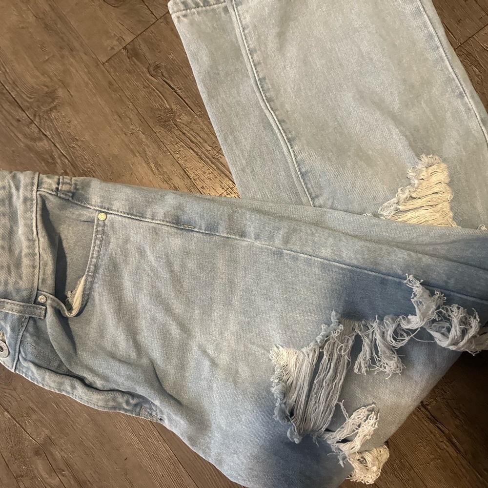 High Rise Light Blue Distressed Jeans